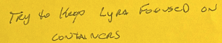 Handwritten text with the words "Try to keep Lyra focused on containers"